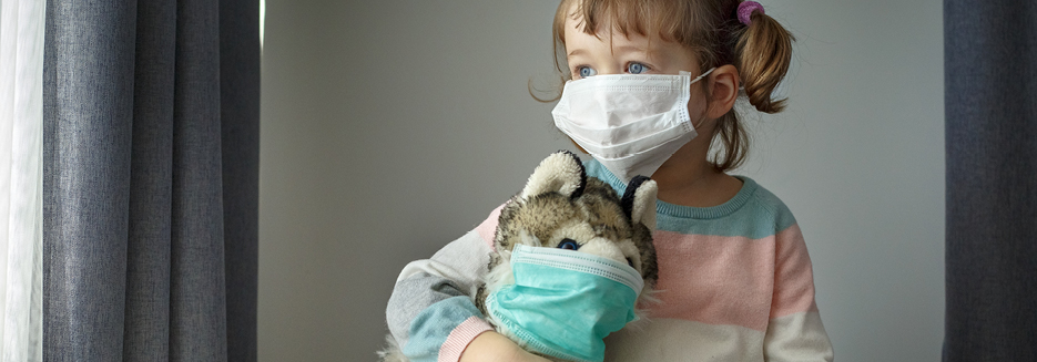 Toddler and her toy dog wearing face masks