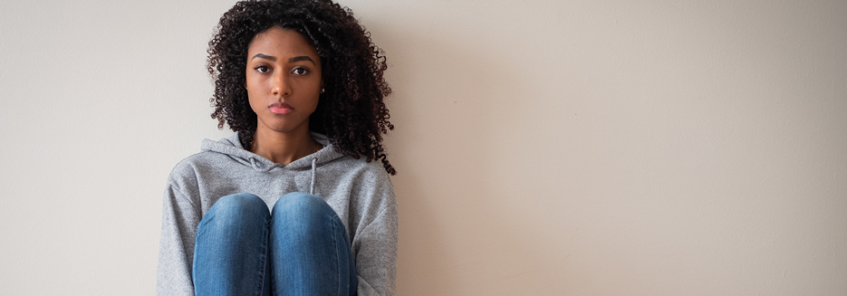 Young girl in trouble feeling sad and depressed